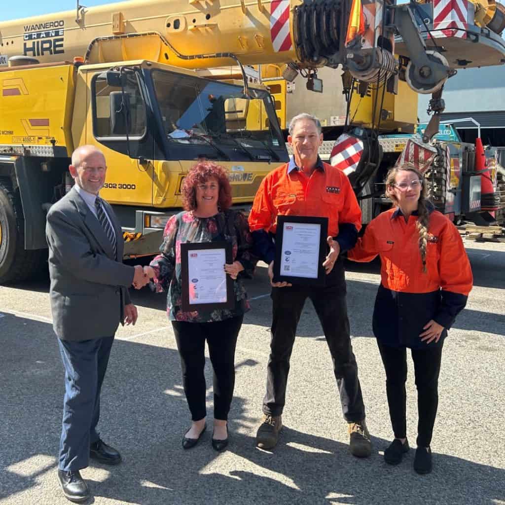 The team at Wanneroo Crane Hire receiving ISO certificate outside